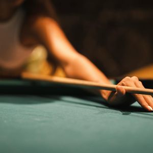 Close-up of hands in a precise, calm position.